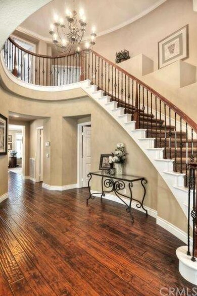 Stunning hardwood floors, raised ceiling and curvi