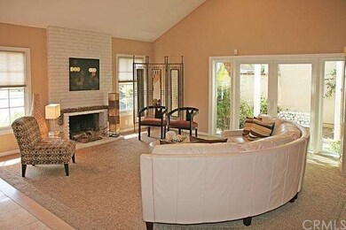 Dual French Doors Lead to Serene Shaded Side Patio