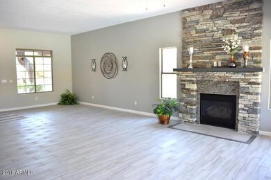 Great room and custom stone fireplace