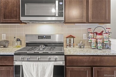 Complete with large cabinets, SS appliances and granite counter tops.
