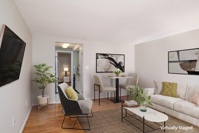 Virtually staged living room to kitchen