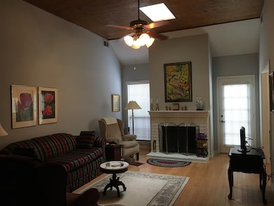Great rooms features a fireplace and high ceiling 