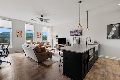 This sun-filled living space features an open layo