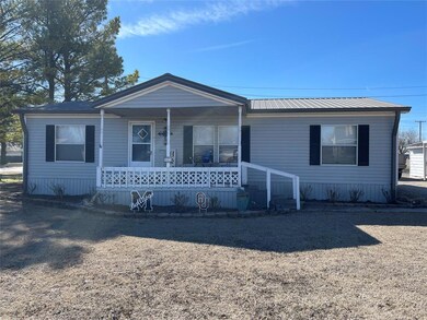 Manufactured / mobile home featuring covered porch