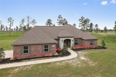 Front Exterior - Nice landscaping, sidewalk to fro