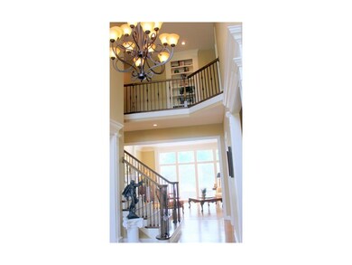 Impressive 2 story home with soaring ceilings, sun