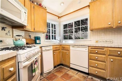 The new vinyl windows over the sink really allow f