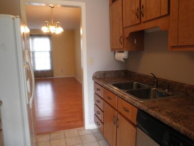 View from the kitchen toward the breakfast area and living room.