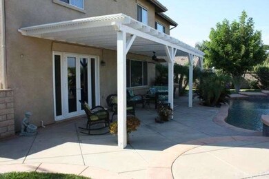 French Doors from the kitchen lead to the patio