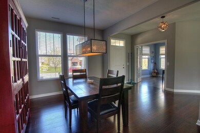 The dining room is to the right, and the office is to the left of the main door.