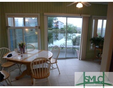 Interior Space/Layout. Enclosed sunroom overlookin