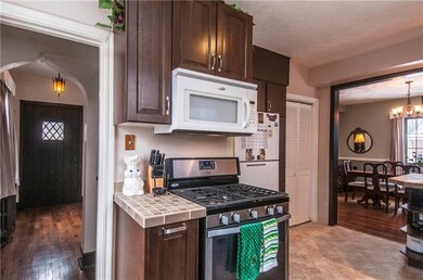 Notice the castle-esque door, light & archway to the left.