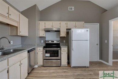 Kitchen Features New Stainless Appliances.