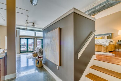 The elevated master bedoom space creates a perfect
