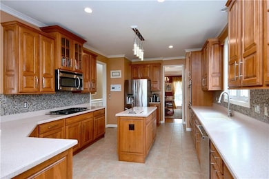 The chef's kitchen is a beautiful and efficient wo