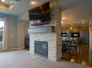 Living room with shared fireplace