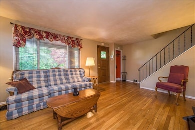 The front door opens into the living room, outfitt
