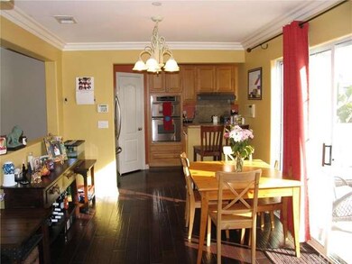 Sunny dining room open to balcony #1