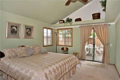 Another shot of master bedroom leading to private patio.