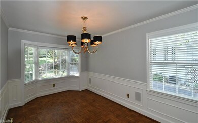 Dining room with bay window.