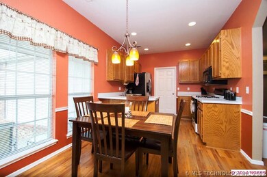 The warm colors of this kitchen are complimented b