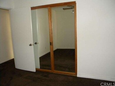 BEDROOM 2. MIRROR CLOSET AND NEW CARPET.
