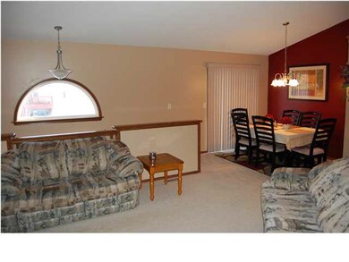 VEIW 2 OF LIVING ROOM AREA AND DINDING AREA.