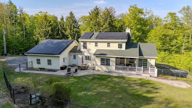 Patio, fire pit, greenhouse, fenced dog yard