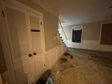 Interior space featuring crown molding