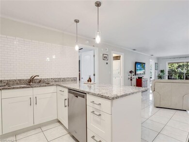 Kitchen with kitchen peninsula, stainless steel di