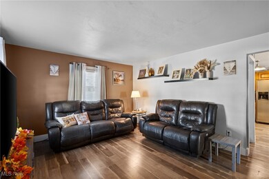Living room featuring wood finished floors