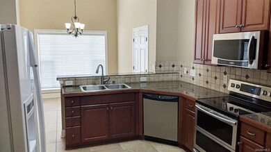 VIEW FROM KITCHEN LOOKING INTO BREAKFAST NOOK. NOT