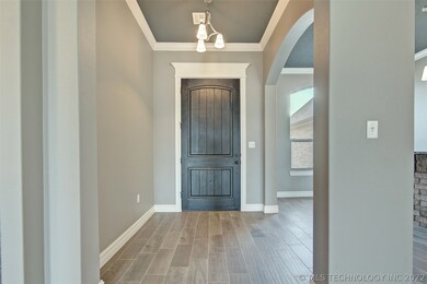 OPEN FOYER WITH A MODERN FLAIR