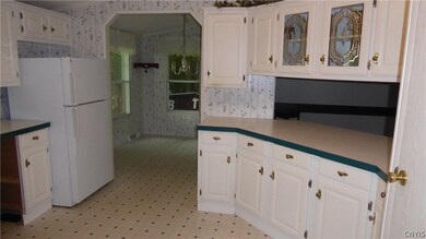 Kitchen area with  an island for eating and entert