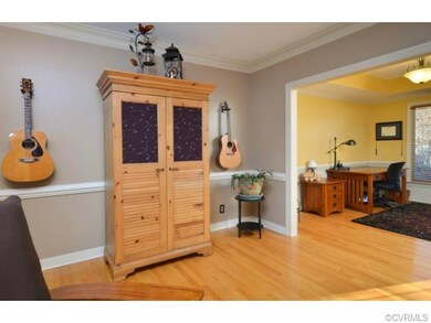 This view shows the living room as it leads to the
