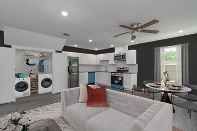 Virtually staged living room, dining room, laundry