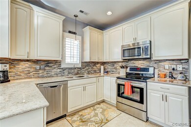 RENOVATED Kitchen with quartz countertops, glass t