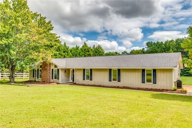 This single story home sits on 1.37 acres & has a