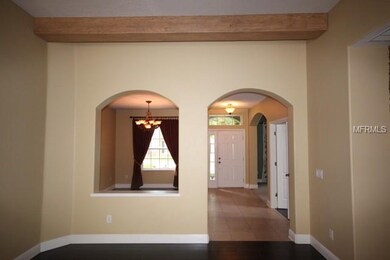 Family room views to dining room, separate living 