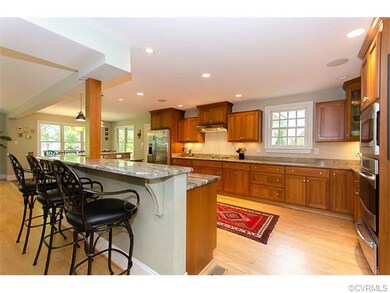 Kitchen with eat-in bar area