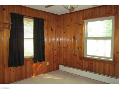 11 x 12 room off of the kitchen could serve as a d