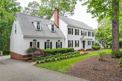 Long Driveway with plenty of parking in rear