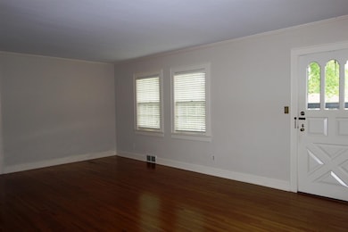 The spacious living room is the perfect spot to ga