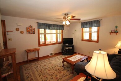Beautiful Re-finished Hardwood Floors in 13x11 Liv