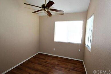 Den off of the Great Room with Wood Floors