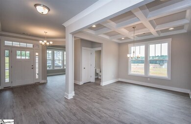 Welcoming foyer with study/formal living off the e