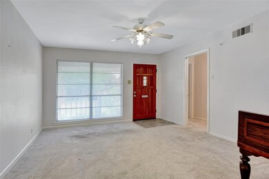 Large living room opens into the dining area.