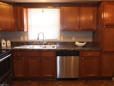 Beautifully remodeled kitchen with new cabinets, n