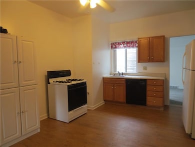 Second floor unit huge kitchen with laminate floor