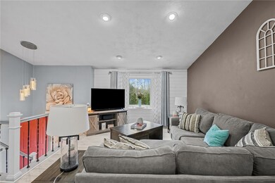 Stairs up to living room